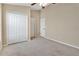 Bedroom with double door closet and carpeted floor at 140 Gladesdown Ct, Deland, FL 32724