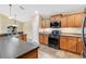 Kitchen with stainless steel appliances and granite countertops at 140 Gladesdown Ct, Deland, FL 32724