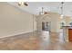 Bright and airy living room with vaulted ceilings and tile floors at 140 Gladesdown Ct, Deland, FL 32724