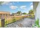 Wooden back deck overlooking the backyard at 1424 Sheridan Sw St, Winter Haven, FL 33880