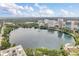 Aerial view of lakefront property with cityscape backdrop at 150 E Robinson St # 3107, Orlando, FL 32801