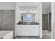 Bathroom with double vanity and soaking tub at 150 E Robinson St # 3107, Orlando, FL 32801