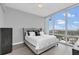 Main bedroom with large window and city views at 150 E Robinson St # 3107, Orlando, FL 32801