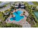 Aerial view of community pool, tennis court and clubhouse at 15863 Burch Island Ct, Winter Garden, FL 34787