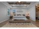 Main bedroom with a platform bed and plenty of natural light at 15863 Burch Island Ct, Winter Garden, FL 34787