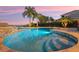 Inviting freeform pool and spa with tranquil water features at 15863 Burch Island Ct, Winter Garden, FL 34787