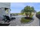 Landscaped walkway leads to a relaxing pool and patio area at 15863 Burch Island Ct, Winter Garden, FL 34787