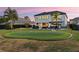 Expansive backyard features a private putting green at 15863 Burch Island Ct, Winter Garden, FL 34787