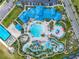 Aerial view of community pool, lazy river, and other amenities at 1611 Kona Ln, Davenport, FL 33897