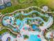 Aerial view of a relaxing lazy river and water features at 1611 Kona Ln, Davenport, FL 33897