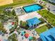 Community pool with hot tub and nearby sports courts at 1611 Kona Ln, Davenport, FL 33897