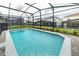 Inviting rectangular swimming pool with surrounding patio at 1611 Kona Ln, Davenport, FL 33897