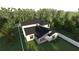 Modern home featuring a backyard patio and surrounding trees at 1700 Underwood Ave, St Cloud, FL 34771