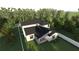 Aerial view of the home showing a back patio and perimeter fencing at 1700 Underwood Ave, St Cloud, FL 34771
