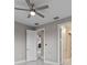 Bedroom showcasing neutral walls, doors to other rooms and marble-like floors at 1700 Underwood Ave, St Cloud, FL 34771