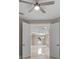 Open living room with marble floors, ceiling fans, and bright, open doorway at 1700 Underwood Ave, St Cloud, FL 34771