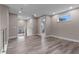 Bright loft area with wood floors, recessed lighting, and neutral wall paint at 1700 Underwood Ave, St Cloud, FL 34771