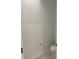 Simple powder room with toilet and sink at 1904 Tohoqua Blvd, Kissimmee, FL 34744