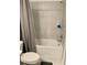 Clean bathroom with shower/tub and gray tile at 1904 Tohoqua Blvd, Kissimmee, FL 34744