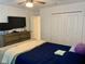 Bedroom with TV and double door closet at 1904 Tohoqua Blvd, Kissimmee, FL 34744