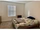 Bedroom with a queen bed, window coverings and nightstand at 1904 Tohoqua Blvd, Kissimmee, FL 34744