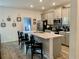 Modern kitchen with gray cabinets, white countertops, and an island at 1904 Tohoqua Blvd, Kissimmee, FL 34744