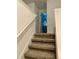 Carpeted staircase to upper floor at 1904 Tohoqua Blvd, Kissimmee, FL 34744