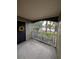 Private screened patio overlooking a landscaped area at 1910 Summer Club Dr # 110, Oviedo, FL 32765