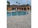 Resort-style swimming pool with lounge chairs at 1910 Summer Club Dr # 110, Oviedo, FL 32765