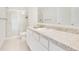 Clean bathroom with shower, toilet and vanity at 1991 Hemingway Cir, Groveland, FL 34736