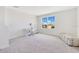 Bright bedroom with window and workspace at 1991 Hemingway Cir, Groveland, FL 34736