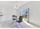 Casual dining area with round table and chairs near sliding door at 1991 Hemingway Cir, Groveland, FL 34736