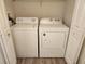 Stackable washer and dryer in a small laundry closet at 202 E South St # 1050, Orlando, FL 32801