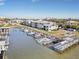 Aerial view of waterfront community with boat slips and resort-style amenities at 2100 N Peninsula Ave # 1030, New Smyrna Beach, FL 32169