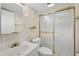 Clean bathroom with white vanity and gold accents at 2100 N Peninsula Ave # 1030, New Smyrna Beach, FL 32169