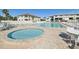 Inviting community pool and spa area with ample seating at 2100 N Peninsula Ave # 1030, New Smyrna Beach, FL 32169