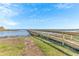 Wooden dock with lake views at 2300 Grasmere View S Pkwy, Kissimmee, FL 34746