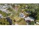 Aerial view of a charming house with a large yard and mature trees at 2501 Center Ave, Orlando, FL 32806