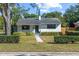 Charming single-story home with well-manicured lawn and updated facade at 2501 Center Ave, Orlando, FL 32806