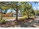 House with mature trees and landscaping at 2501 Center Ave, Orlando, FL 32806