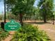 Wadeview Park entrance featuring a green sign and lush landscaping at 2501 Center Ave, Orlando, FL 32806