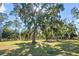 Picturesque park landscape with large trees and grassy areas at 2501 Center Ave, Orlando, FL 32806