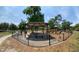 A playground with shaded seating and play structures for  at 2501 Center Ave, Orlando, FL 32806