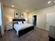 Main bedroom with ample space and en-suite bathroom access at 2523 Avalon Park Blvd, Tavares, FL 32778