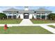 Resort-style pool with cabanas and gate at 2523 Avalon Park Blvd, Tavares, FL 32778