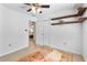 Bright bedroom with double door closet and access to another room at 2779 Prince John Rd, Winter Park, FL 32792