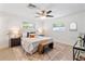 Spacious main bedroom with a king-size bed and lots of natural light at 2779 Prince John Rd, Winter Park, FL 32792