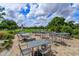 Outdoor patio furniture overlooking the golf course at 2779 Prince John Rd, Winter Park, FL 32792