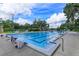 Community lap pool with ample deck space at 2779 Prince John Rd, Winter Park, FL 32792