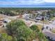 Aerial view of residential neighborhood with houses and roads at 3054 Shallowford St, Deltona, FL 32738